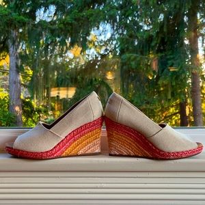 Off white canvas wedge with rainbow heel. Only worn twice.